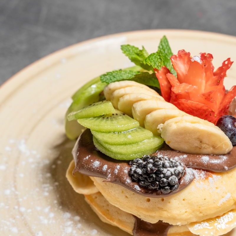 Pancakes with fruits of the day and Nutella