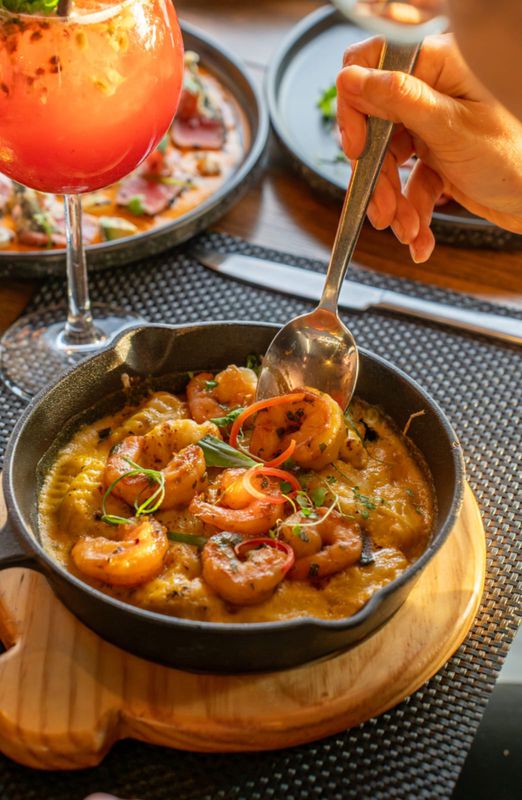 Gnocchi a la Huancaína con Camarón Saltado